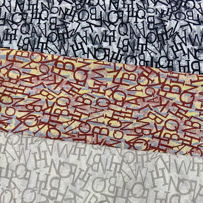 Tejido jacquard rojo letras